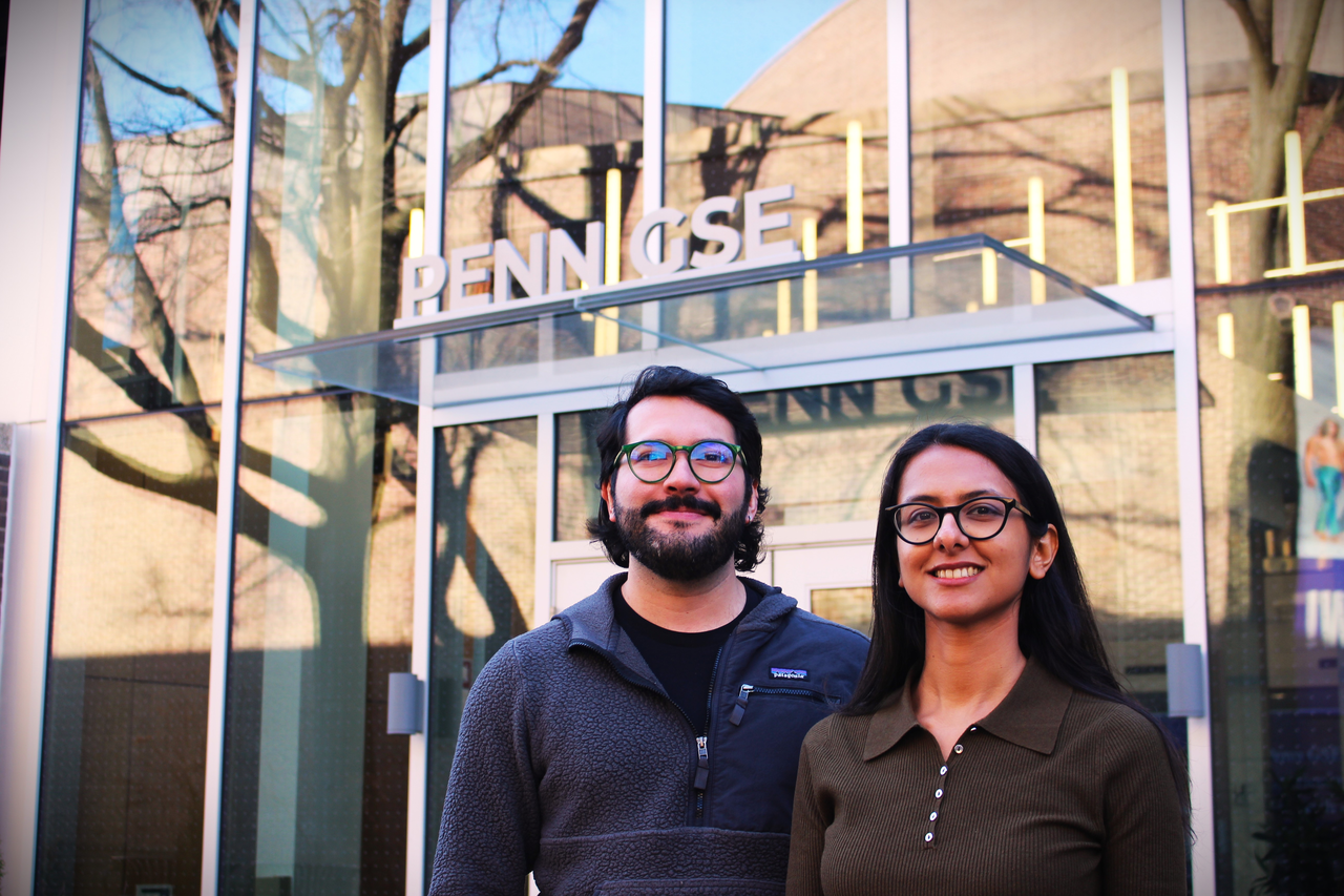 Luis Morales-Navarro and Shruti Mehta in front of the Penn GSE building
