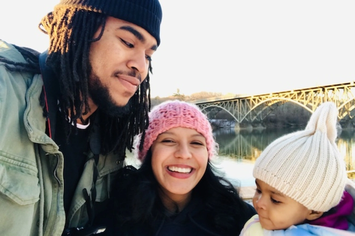 Janay Garrett, center, with her husband James and their daughter. 