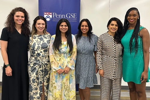 Group photo of The inaugural Jacobs Fellows (Heidi Mitchell, Natalia Rodriguez, Sidra Alvi, Neha Gupta, Aqeela Allahyari, and Psacoya Guinn)