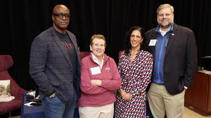 Roger Ward, Karen Weaver, Dean Katharine Strunk, and Jeff Doggett pose together smiling in a line